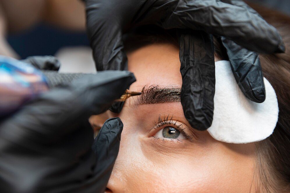 young-woman-getting-beauty-treatment-her-eyebrows