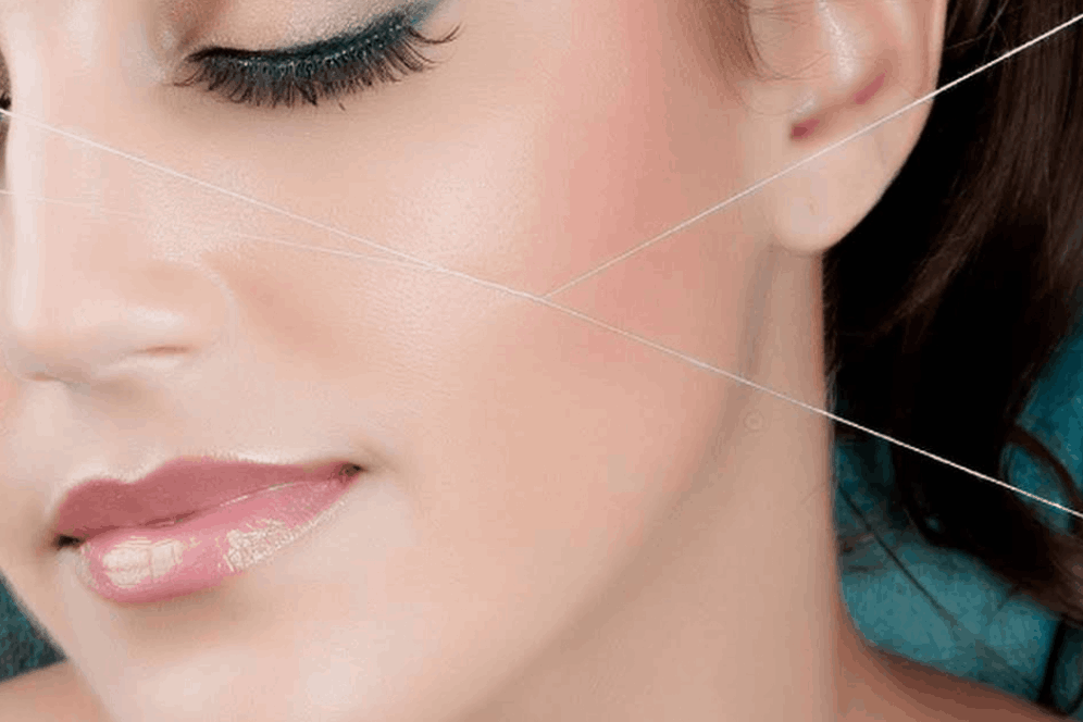 threading for sleek sideburns